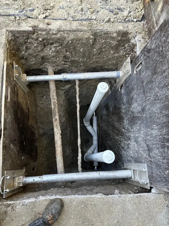 Experienced plumber completing Drain Cleaning work in Experiment